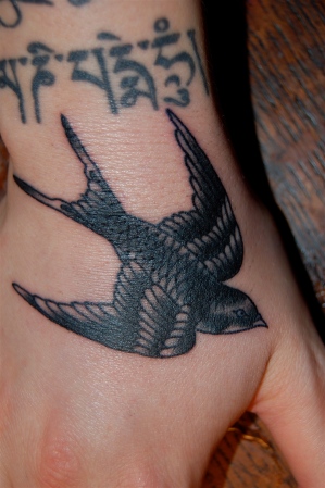 black bird tattoo. lack bird tattoos,