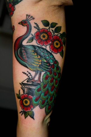 I colored this inner arm peacock in today we did the outline around two 